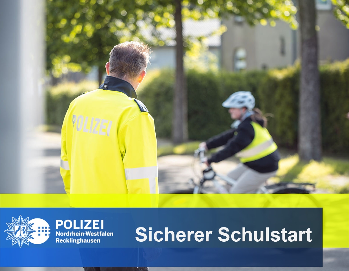 Ein Schulkind auf dem Fahrrad und ein Polizist.